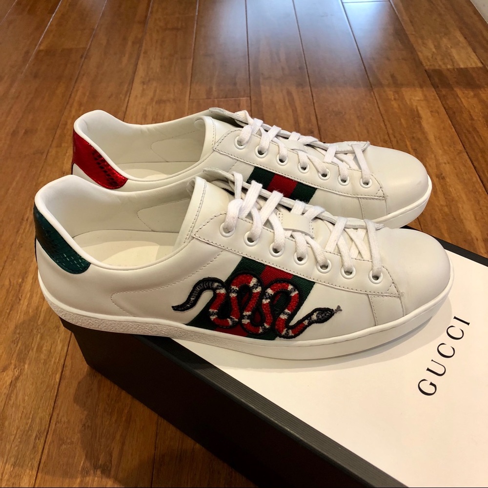 Men’s Gucci Ace Sneakers with embroidered snakes.